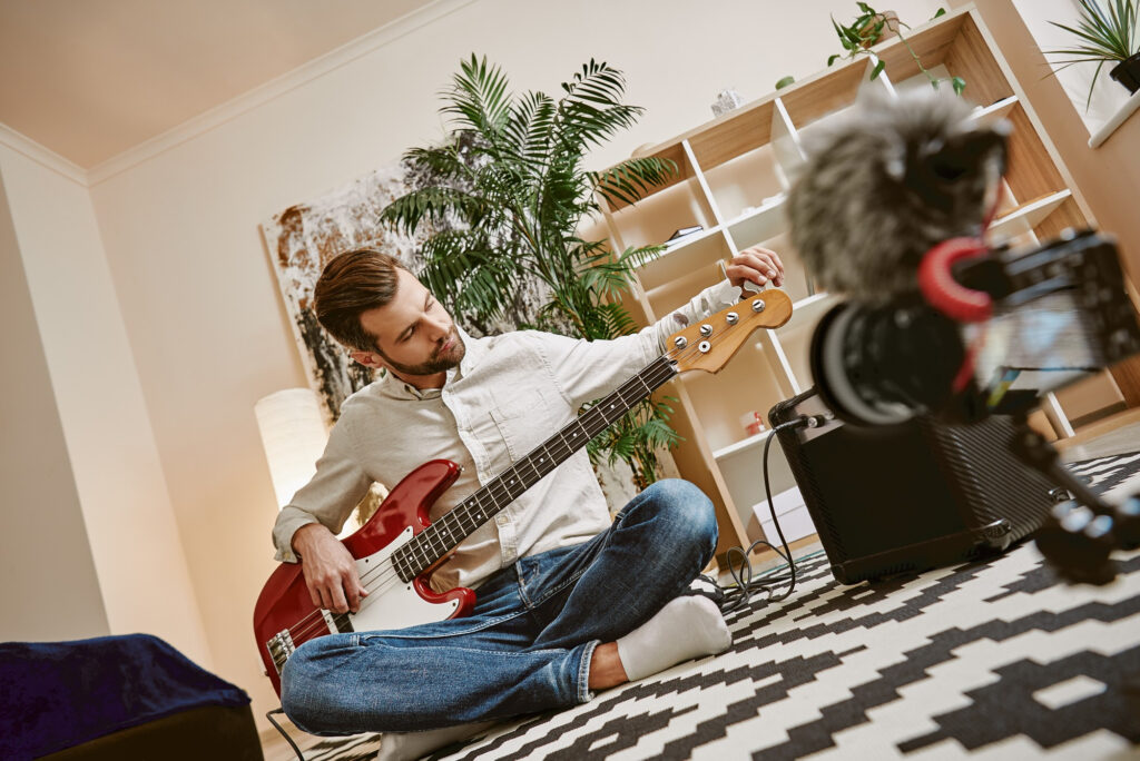 preparing-instrument-handsome-male-music-blogger-adjusting-electric-guitar-recording-new-video